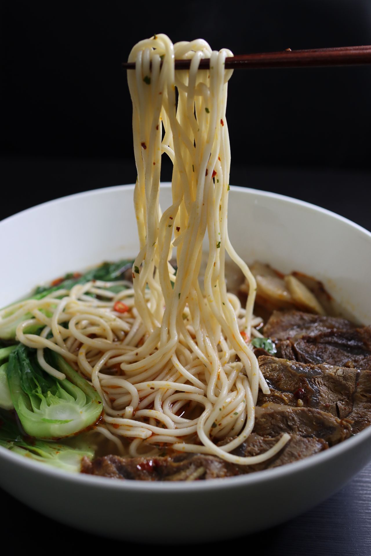 Chinese Lanzhou Beef Noodle Soup, Hand Pulled Noodles, with Beef Shank, Bok Choy, Green Onions, Daikon Radish - Noodle Pull