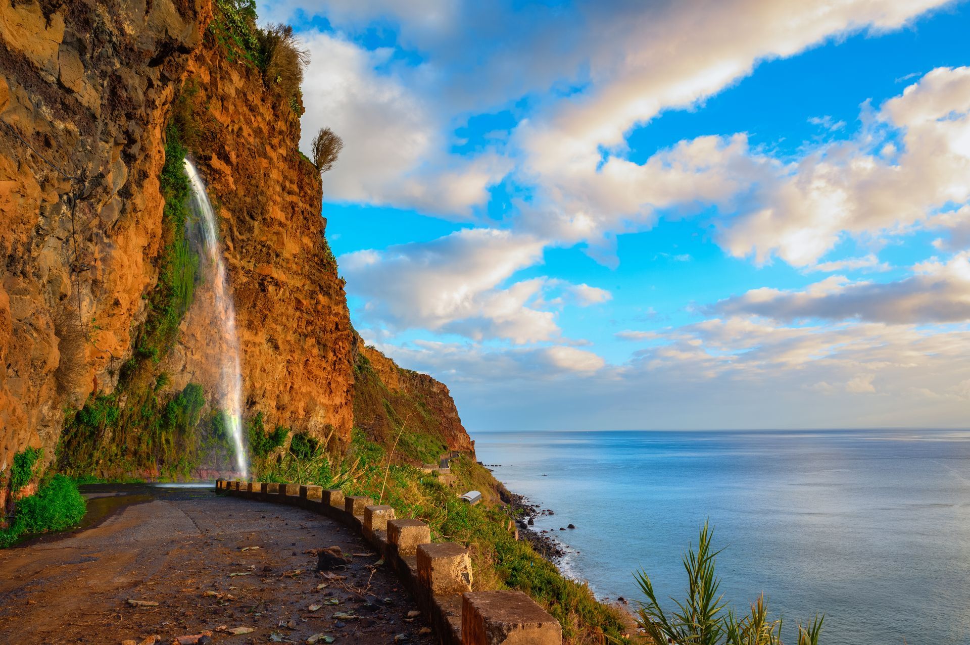 Waterfall on an old road near Ponta do Sol in Madeira Island, Portugal