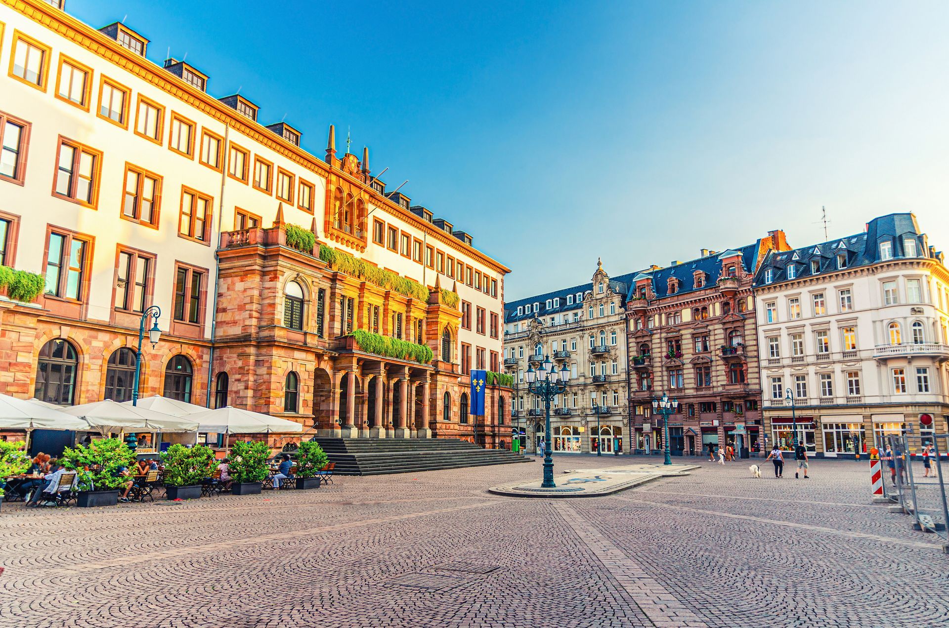 Wiesbaden City Palace Stadtschloss or New Town Hall Rathaus neo-classical building on Schlossplatz Palace Square in historical city centre, blue sky background, State of Hesse, Germany
