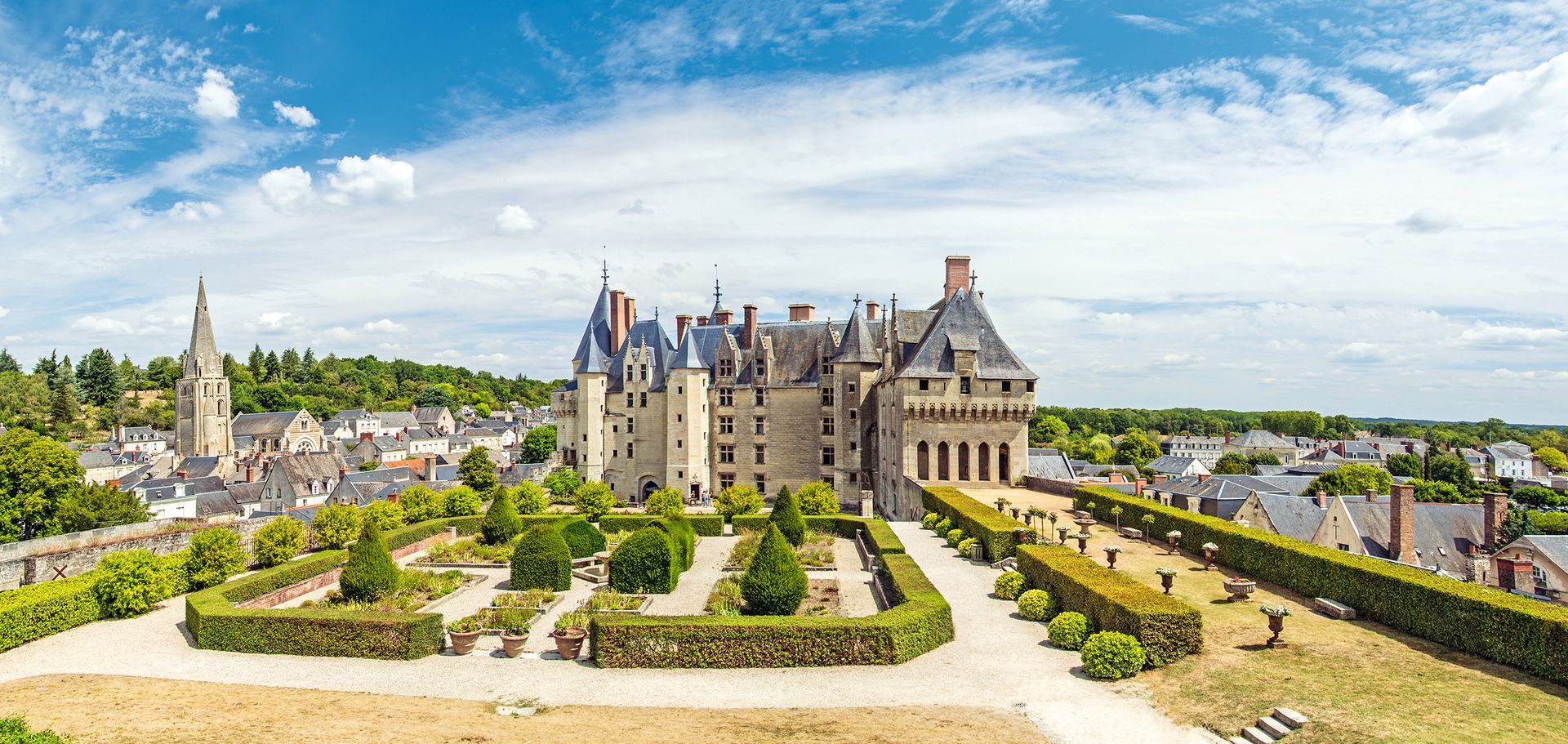 The Langeais castle (Château de Langeais) and the medieval Church of Eglise Saint-Laurent on the Loire Valley, France