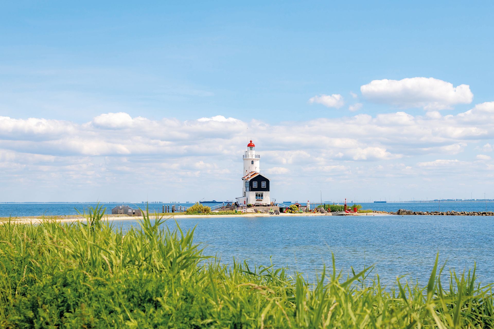 The Horse Of Marken Lighthouse with blue sky and white clouds, P
