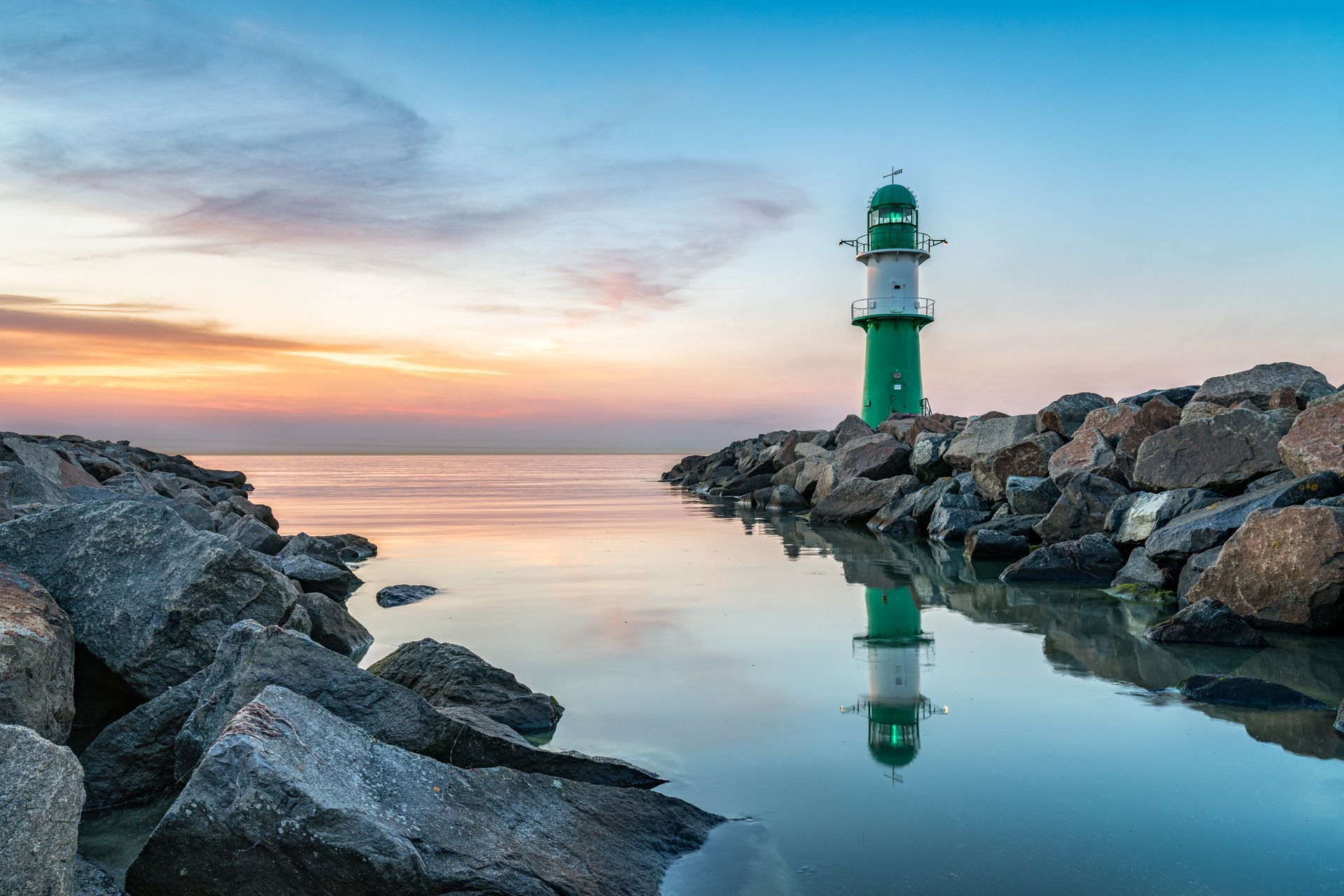 Westmole lighthouse in Warnemünde near Rostock, Germany