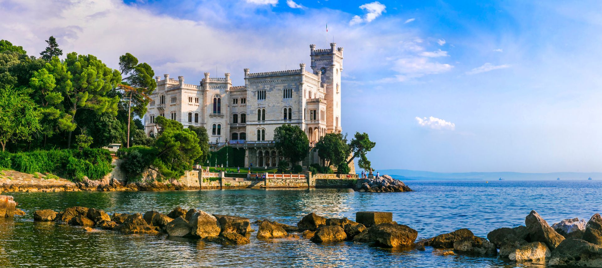 Wide Panorama of Miramare Castle in Trieste — Elegant White Habsburg Palace on the Adriatic Coast with Scenic Park and Sea Garden, Friuli Venezia Giulia Italy