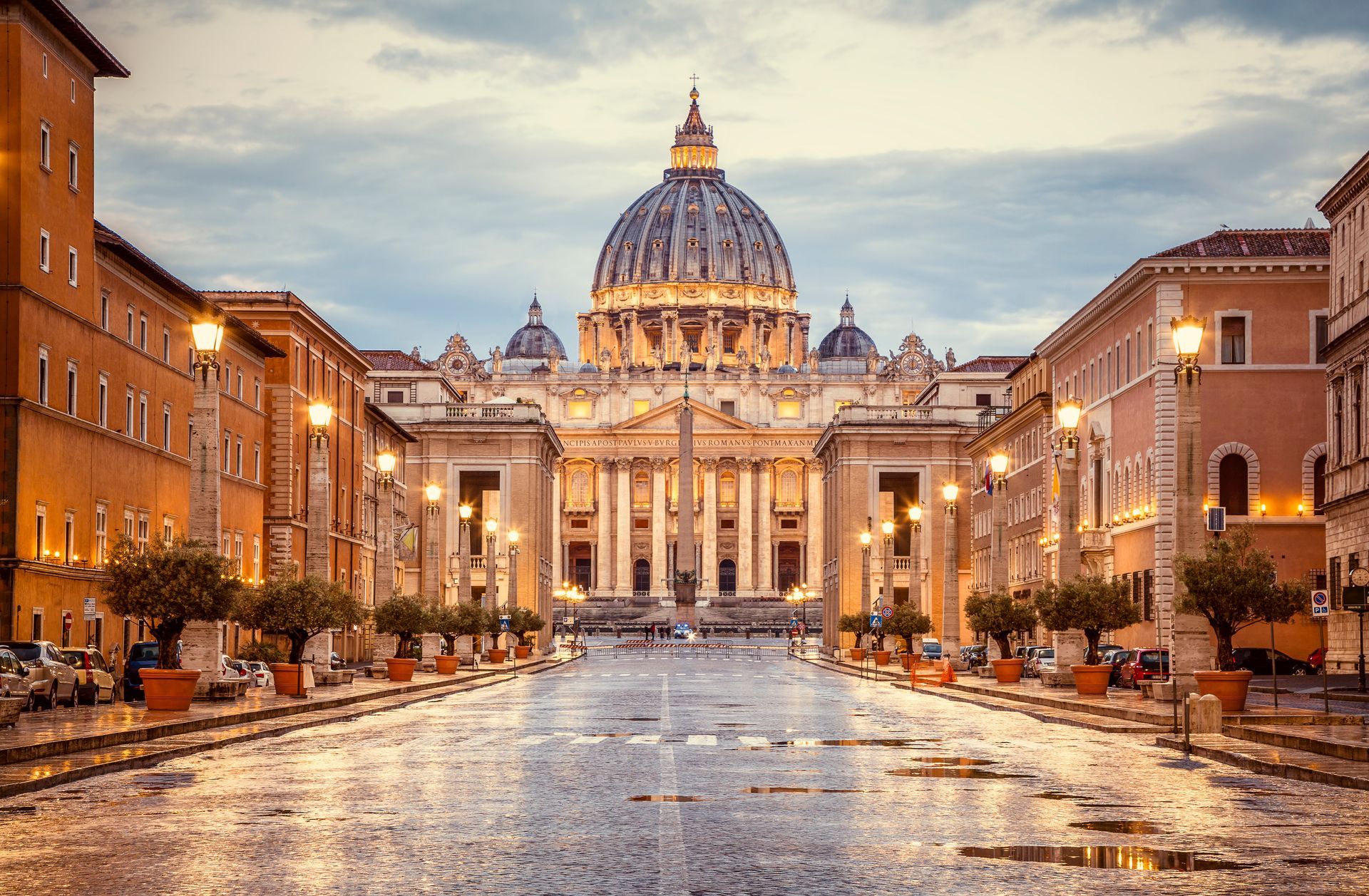 St. Peter's Basilica in the evening from Via della Conciliazione in Rome. Vatican City Rome Italy. Rome architecture and landmark.  St. Peter's cathedral in Rome. Italian Renaissance church