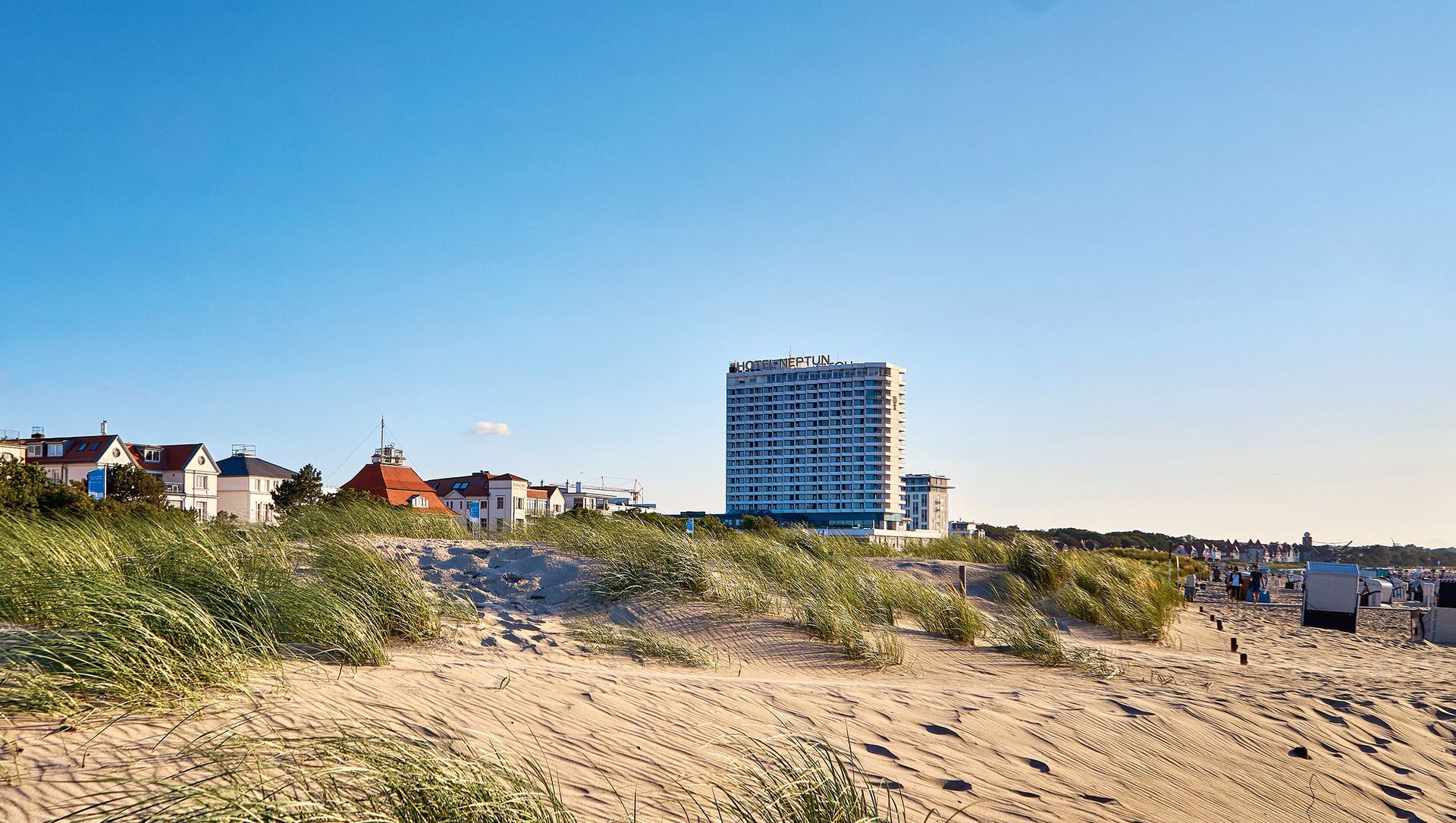 Panorama from the Hotel Neptun and the city of Warnem�ehind the dunes on the Baltic Sea beach.