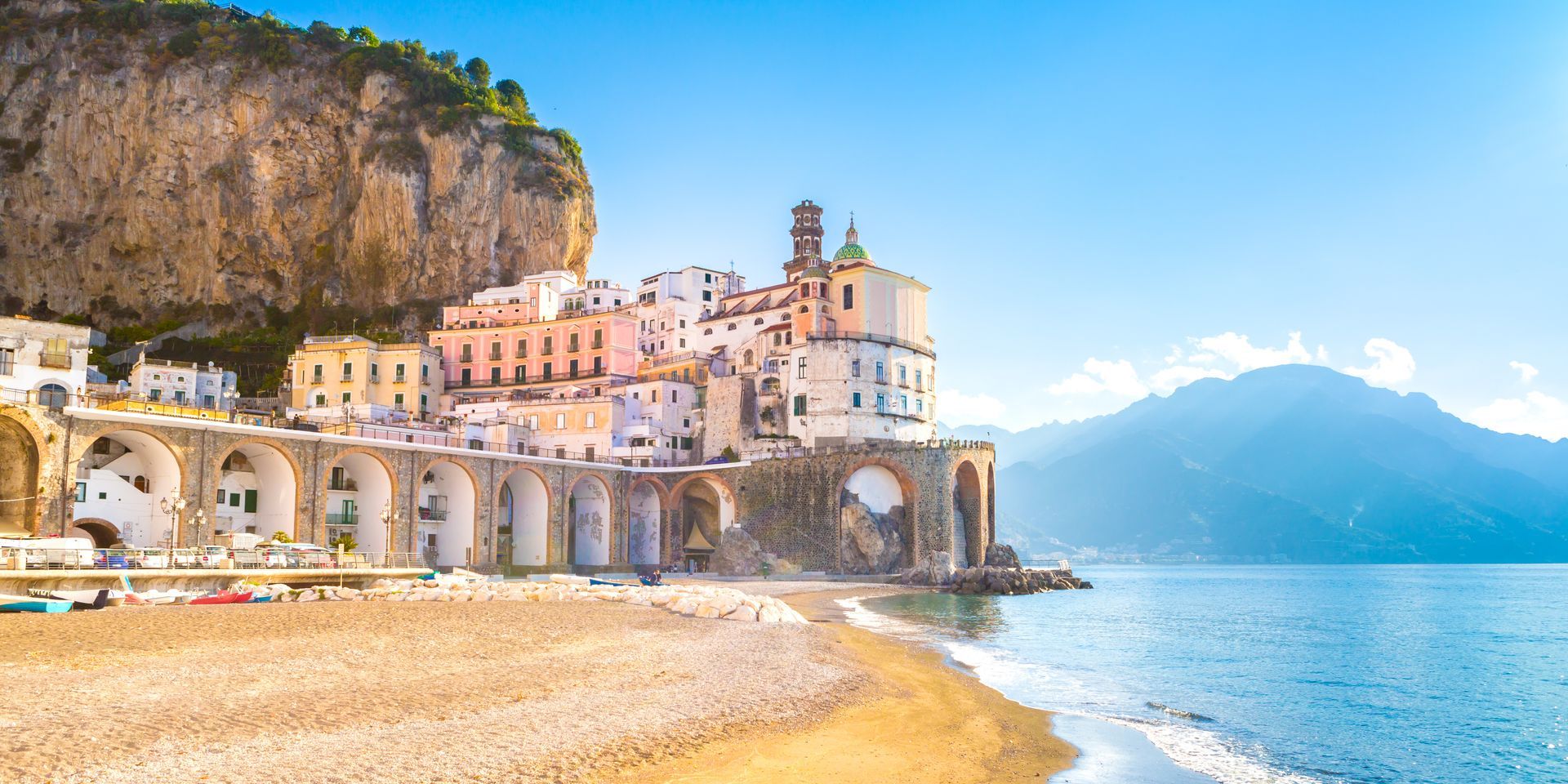 Morning view of Amalfi cityscape on coast line of mediterranean sea, Italy