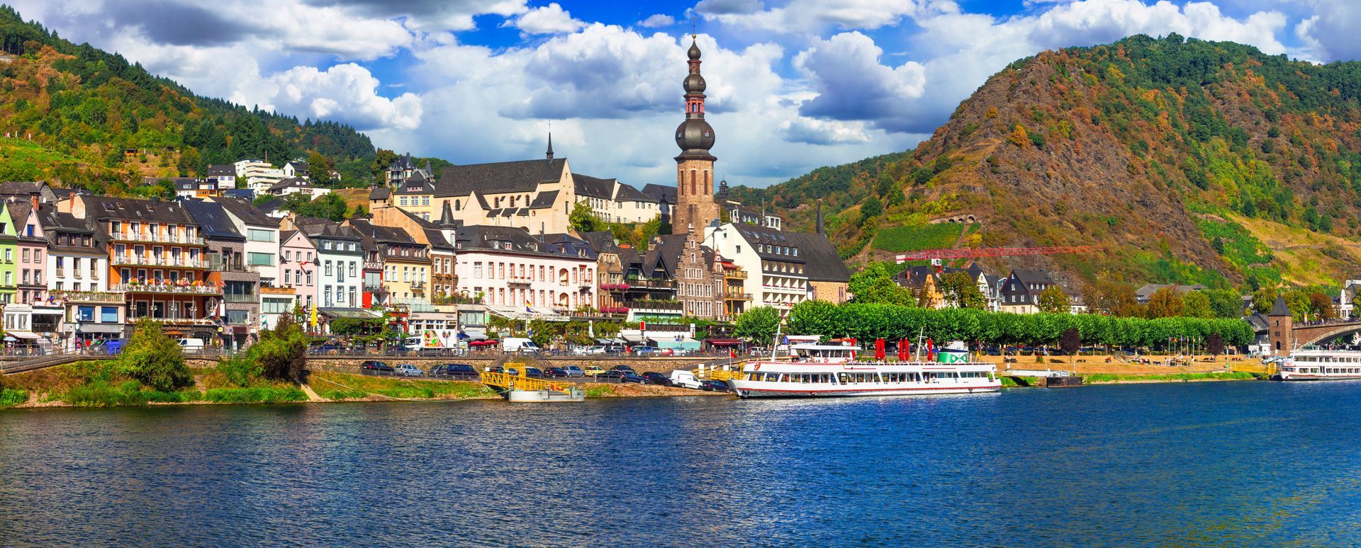 Stunning 10K Panorama of Cochem Town on Moselle River with St Martin Church and Cruise Ship Scenic Rhineland-Palatinate Landscape with Medieval Architecture and Traditional German Houses