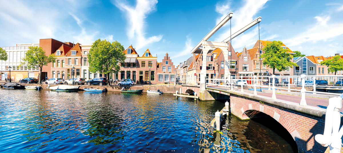 Historic old town of Alkmaar, North Holland, with typical canal houses and draw bridge