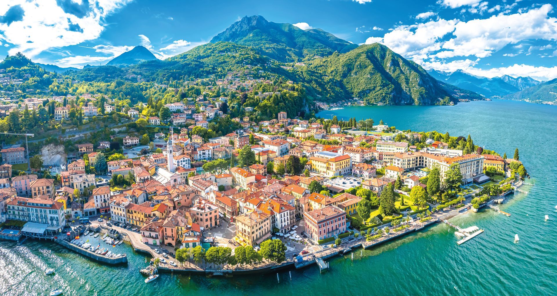 Como Lake and town of Menaggio waterfront aerial panoramic view, Lombardy region of Italy